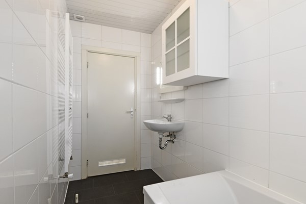 Medium property photo - Elise van Calcarstraat 9, 2522 MA Den Haag